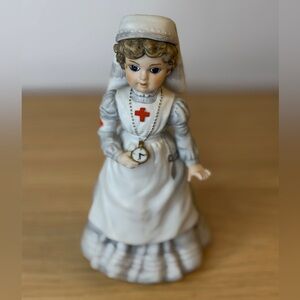 Enesco Vintage Nurse Clara Figurine in White and Gray